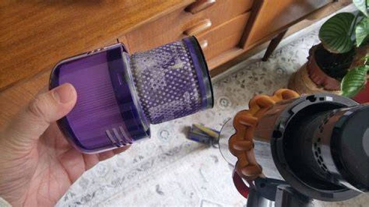 How do I change the brush on my Dyson